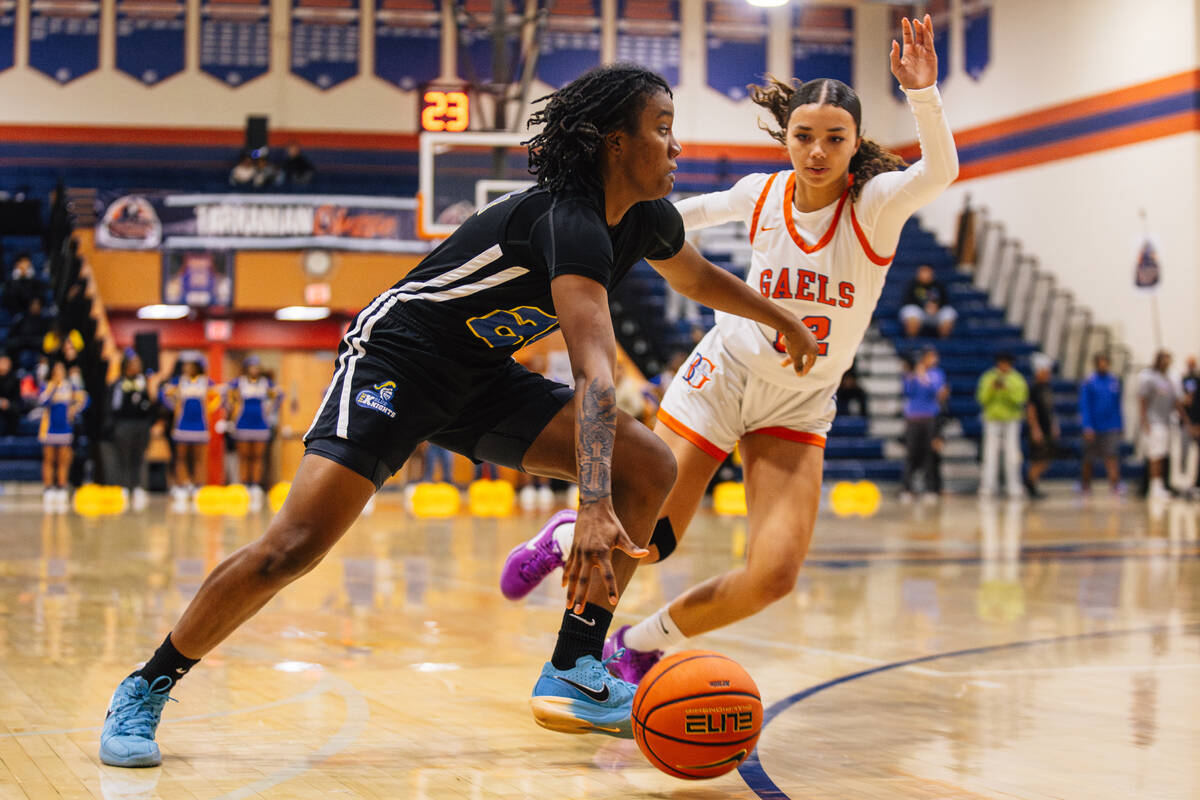Democracy Prep forward La'Niah Hicks (24) dribbles the ball during a girls basketball game ...