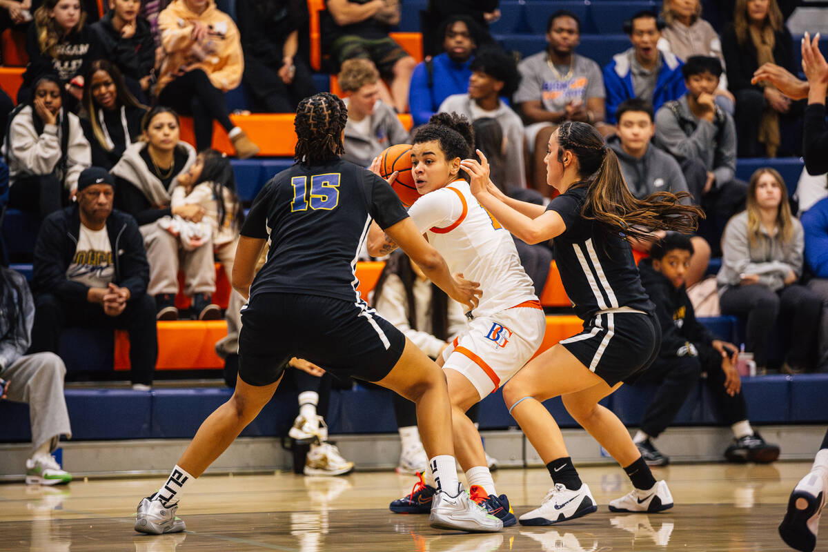Bishop Gorman point guard Aaliah Spaight (10) looks for an open teammate during a girls basketb ...