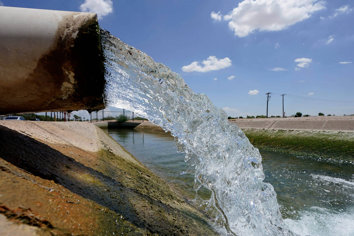 Water from the Colorado River diverted through the Central Arizona Project fills an irrigation ...