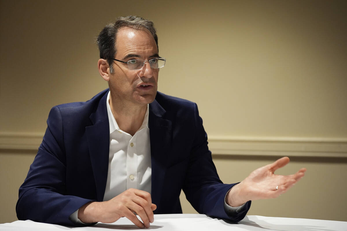 Colorado Attorney General Phil Weiser speaks during an interview with The Associated Press on N ...