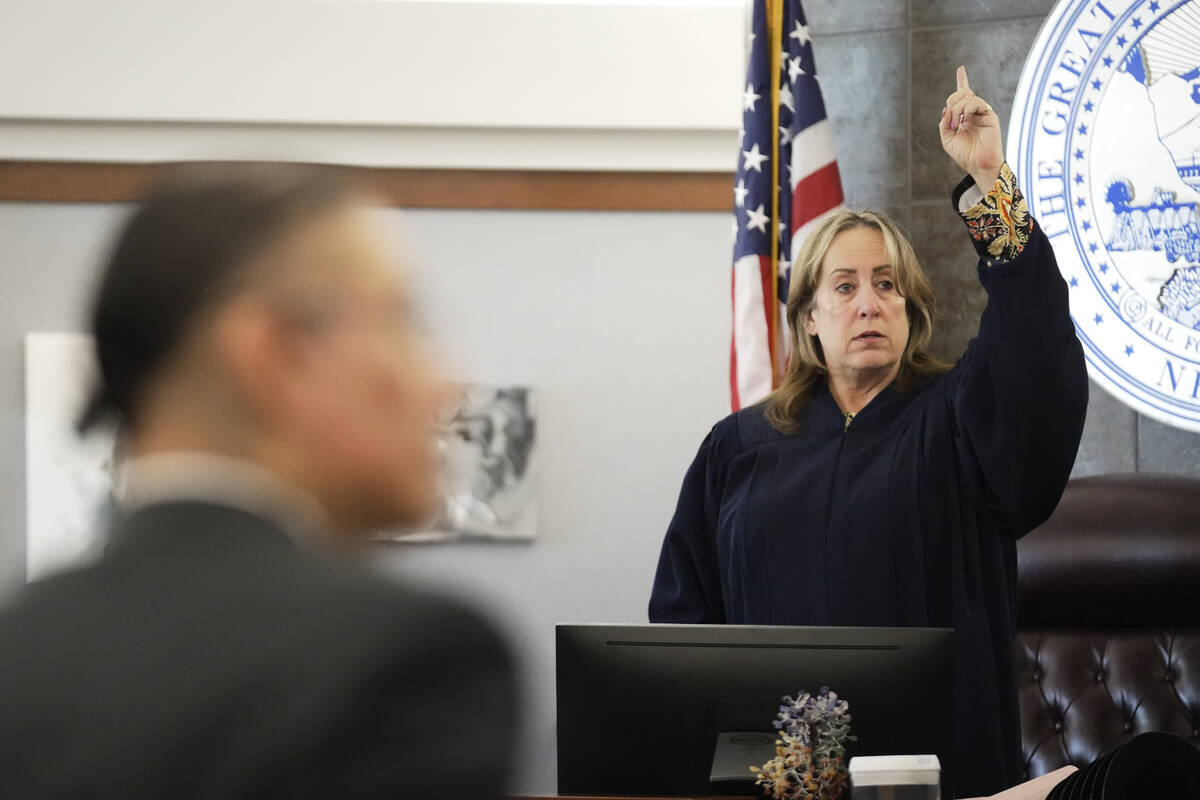 Judge Jessica Peterson, right, presides over the trial of Nathan Chasing Horse, left, on charge ...