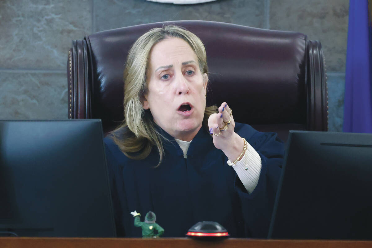 District Judge Jessica Peterson instructs the Review-Journal reporter to leave her courtroom du ...