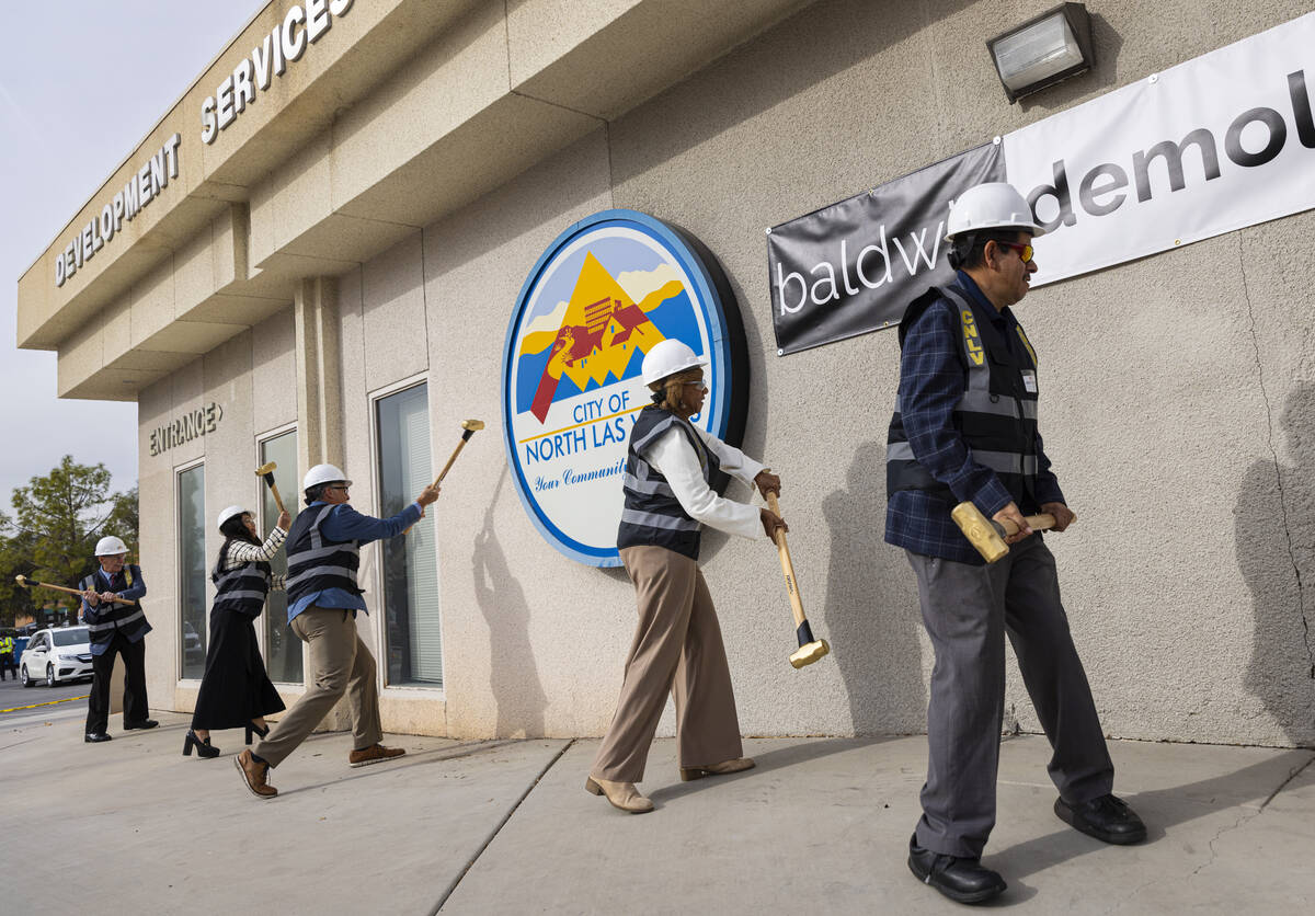 North Las Vegas Mayor Pamela Goynes-Brown, center, alongside North Las Vegas City Councilman Is ...