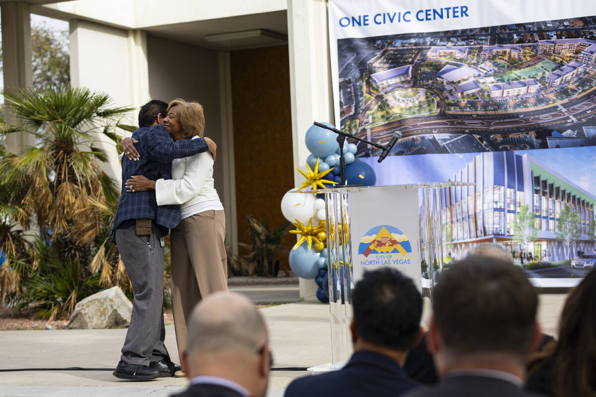 North Las Vegas City Councilman Isaac Barron, left, hugs Mayor Pamela Goynes-Brown during an ev ...