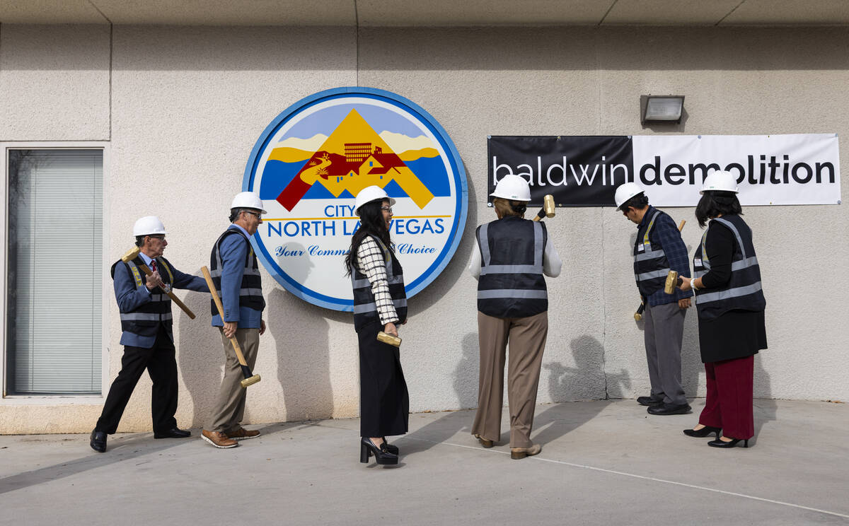 North Las Vegas City Manager Micaela Moore, center left, and North Las Vegas Mayor Pamela Goyne ...