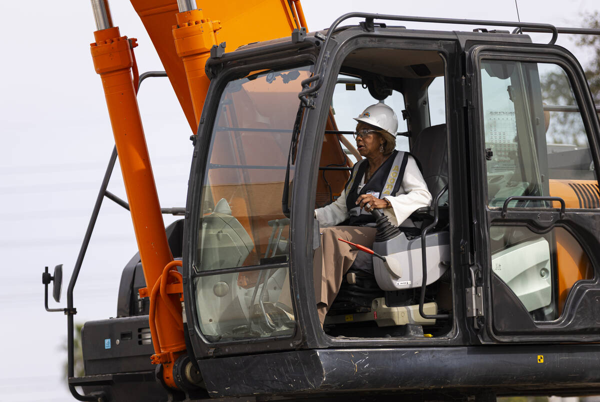 North Las Vegas Mayor Pamela Goynes-Brown operates an excavator during an event to kick off the ...