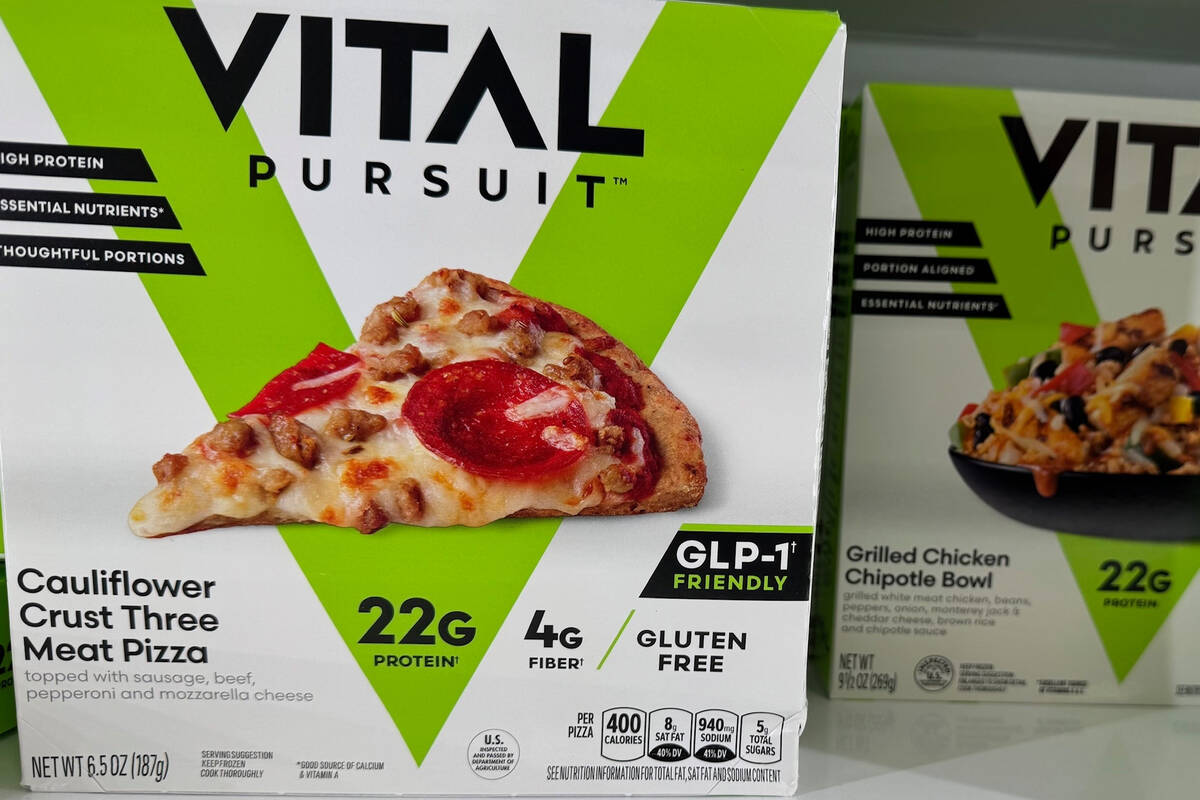 Meals with "GLP-1 Friendly" labels sit on the shelf of a Kroger grocery store Tuesday ...