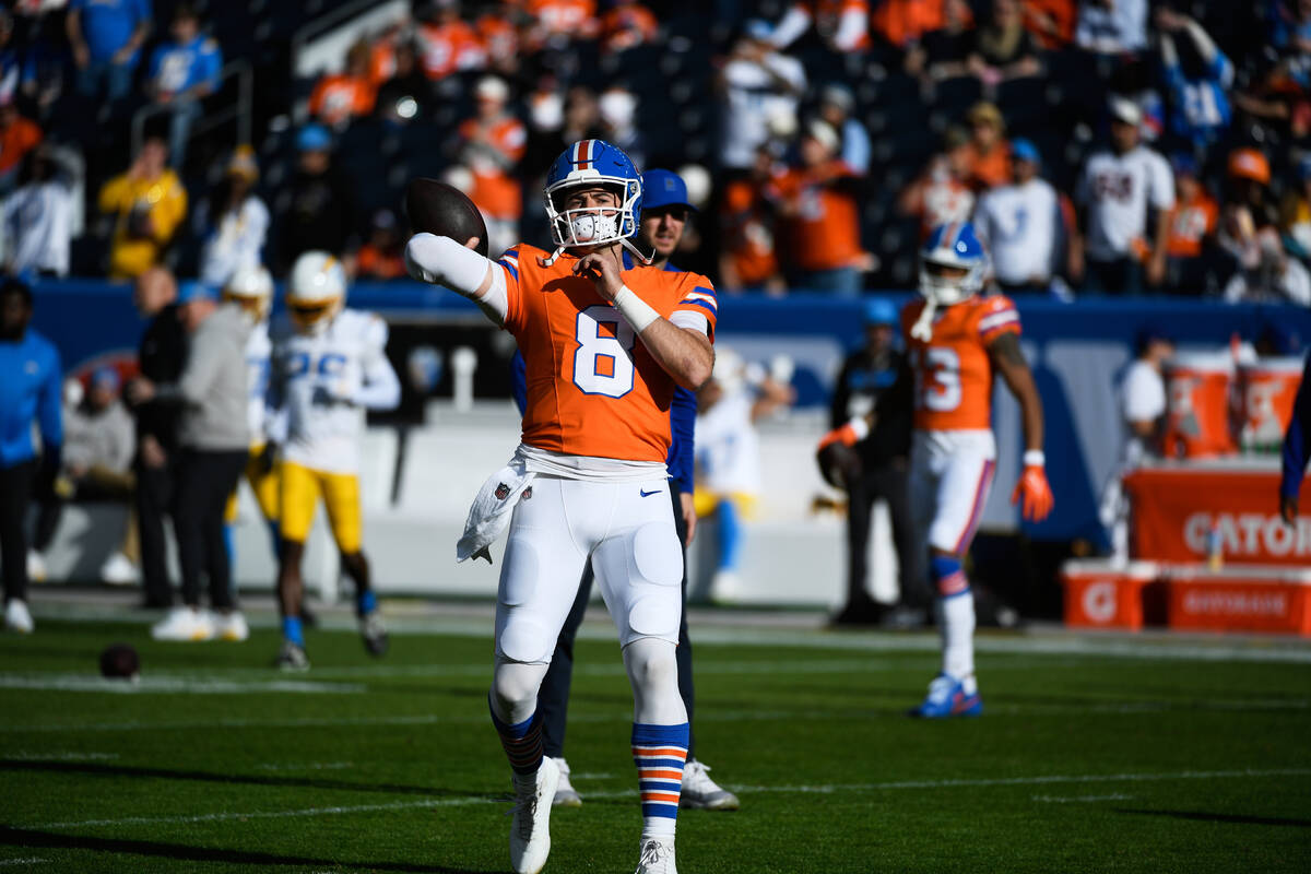 Denver Broncos quarterback Jarrett Stidham (8) before an NFL football game Sunday, Jan. 4, 2026 ...