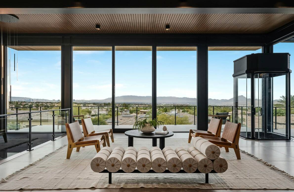 Located in MacDonald Highlands at 1707 Tangiers Dr., this 6,926 square foot, five bed and eight ...