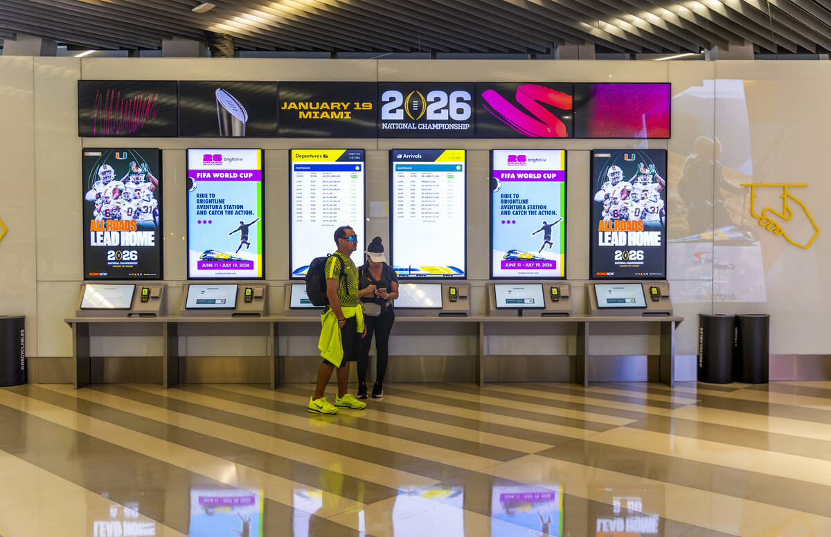 Passengers await their train after purchasing tickets at the Brightline MiamiCentral Station on ...
