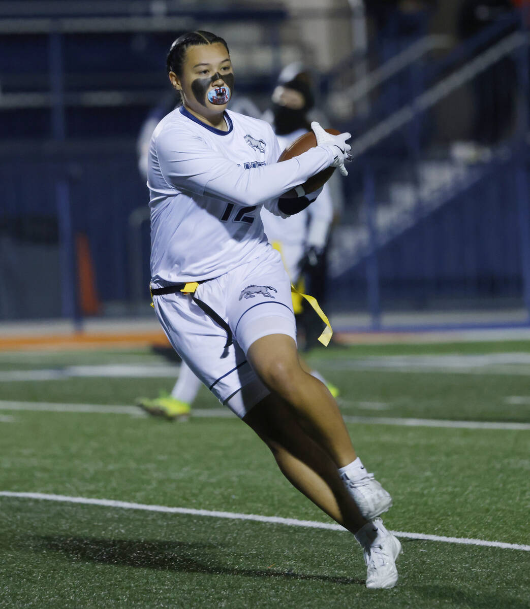 Shadow Ridge's Jaylani Palmer (12) scores her third touchdown against Bishop Gorman during ...