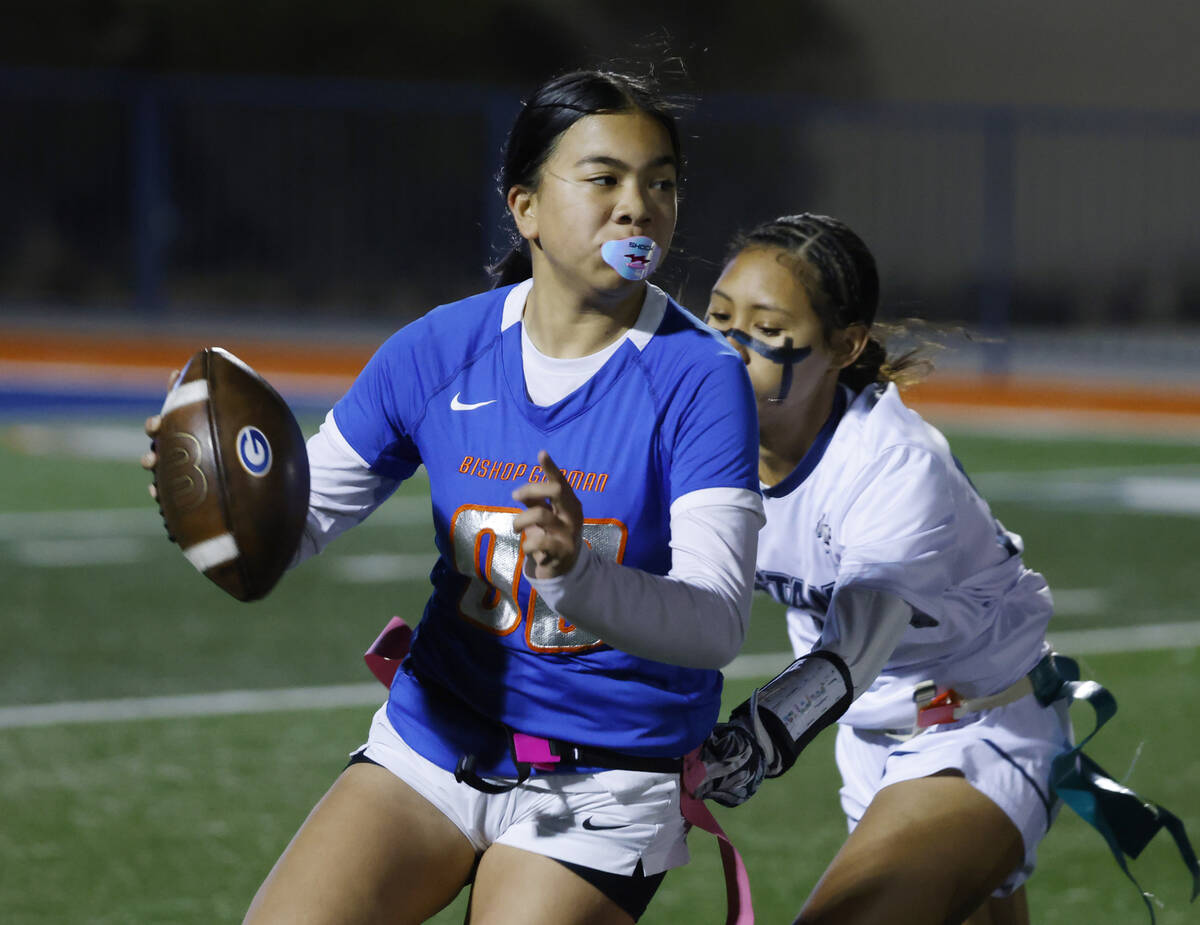 Bishop Gorman's quarterback Zehani English (00) gets her flag pulled by Shadow Ridge' ...