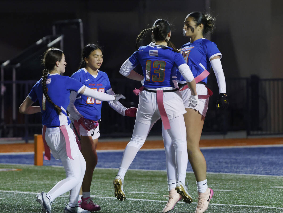 Bishop Gorman's wide receiver Preseah Williams, right, celebrates her touchdown with her t ...