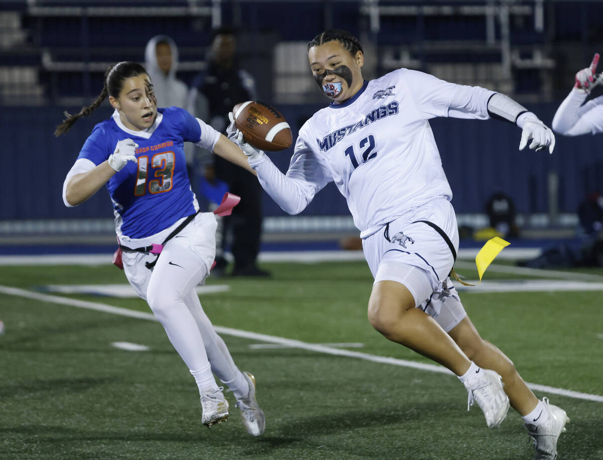 Bishop Gorman's defensive back Sienna Gostanian (13) chases Shadow Ridge's Jaylani Pa ...