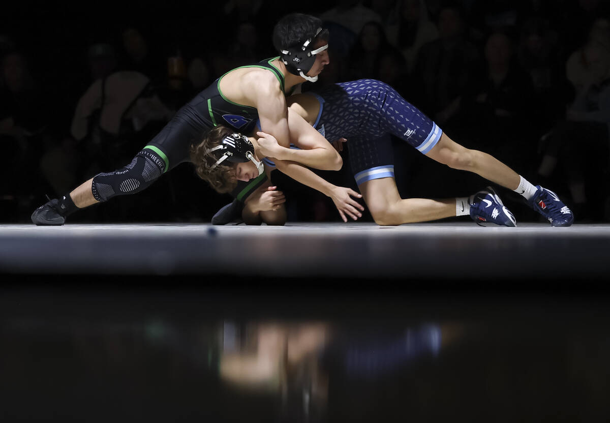 Green Valley’s Angel Arguello competes against Centennial’s Lorenzo Dukes during ...