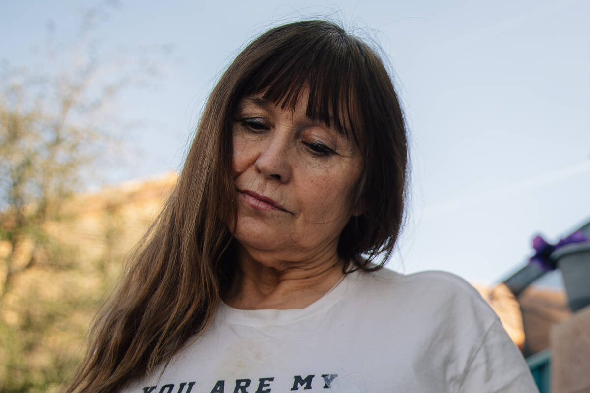 Cheri Brown looks down at a photo of her daughter, Amber Brown, who was killed by a reckless dr ...