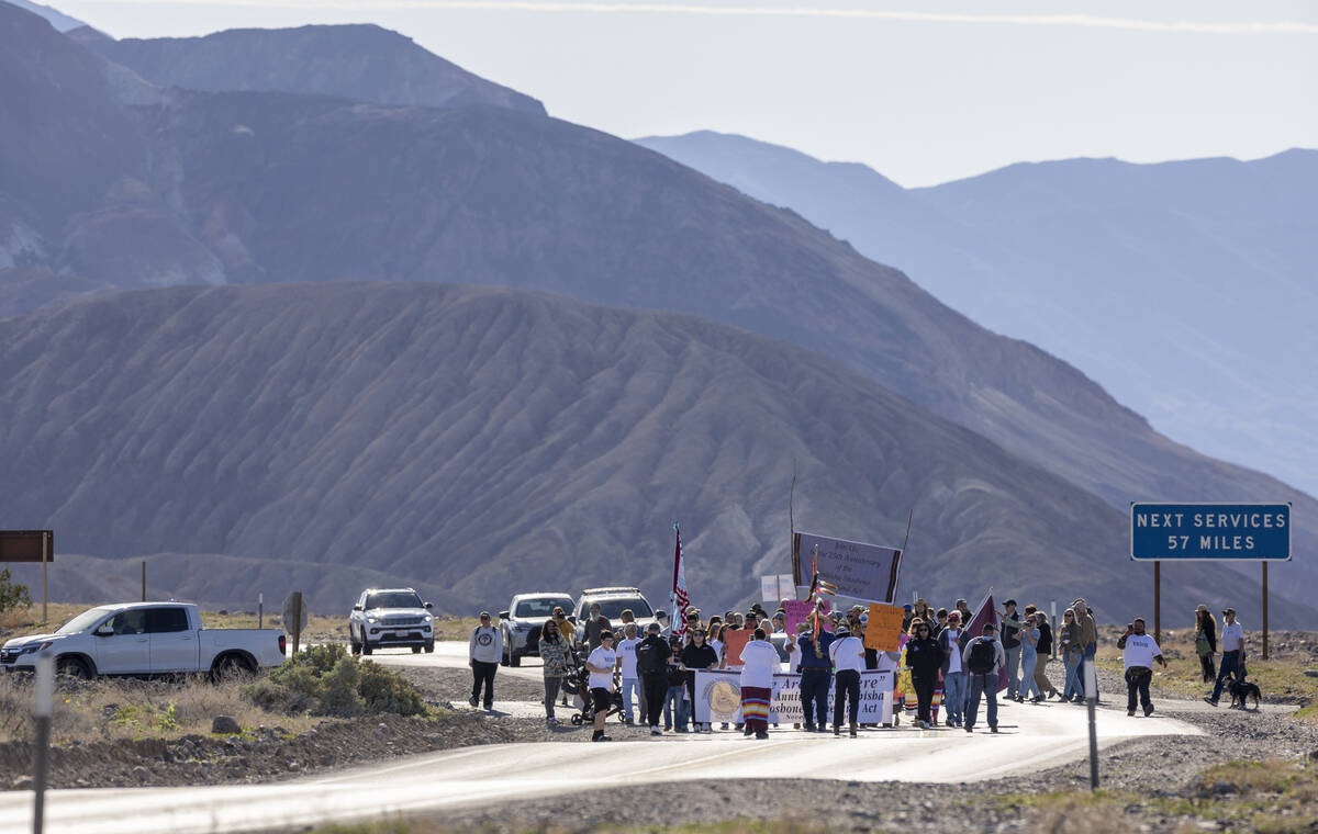 People assemble on the road as the Timbisha Shoshone tribe hosts a march ending at the visitor ...