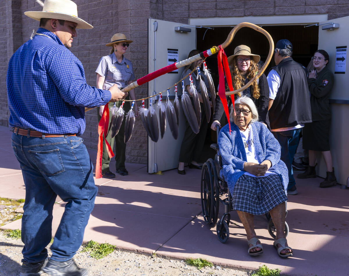 Timbisha Shoshone tribal elder Pauline Esteves, 101, looks to Trevor Stevens of Elko during a g ...