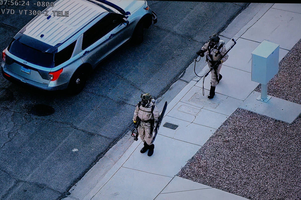 Aerial footage shows an investigation being conducted during a press briefing about a warrant t ...