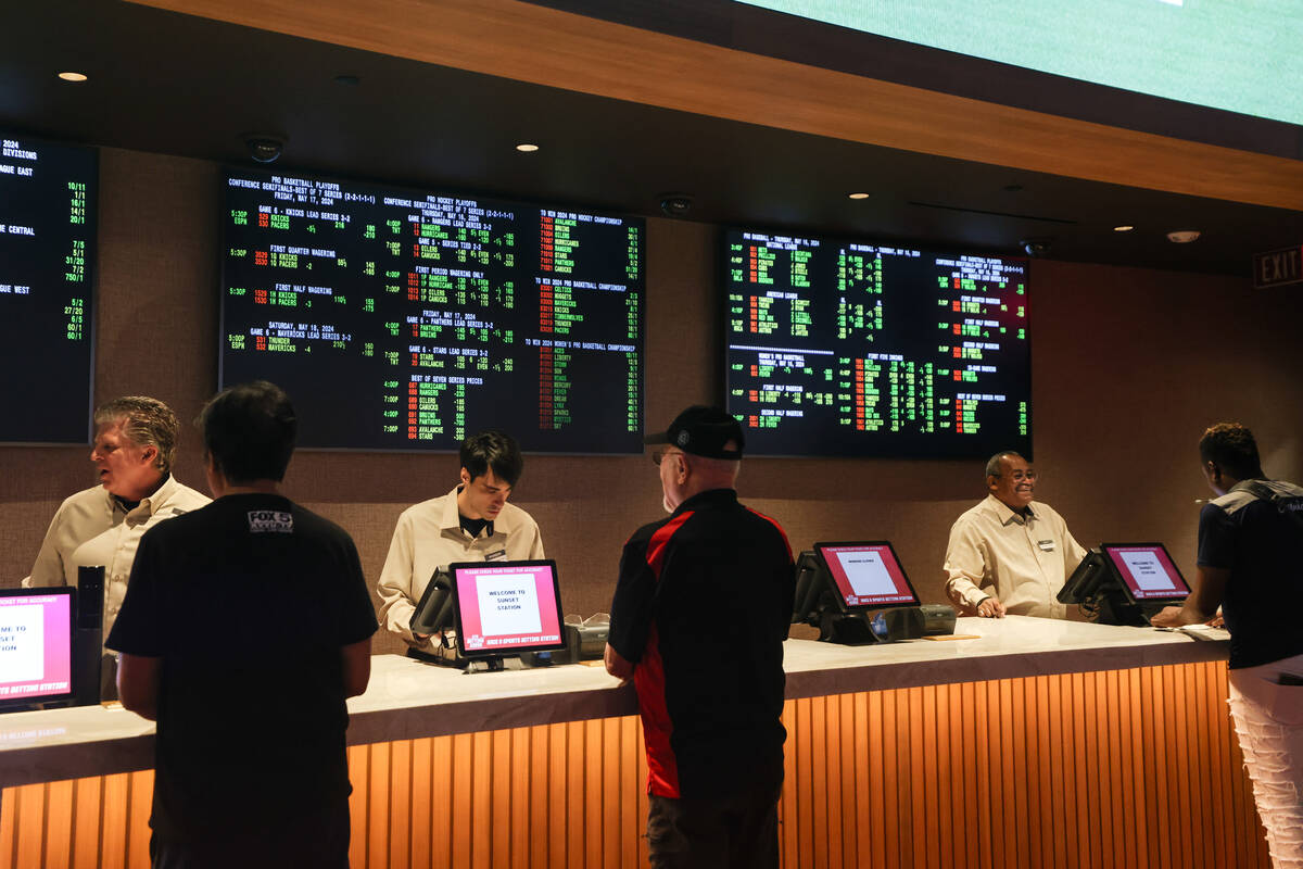 Guests line up to place bets at the newly renovated STN Sportsbook at Sunset Station hotel-casi ...