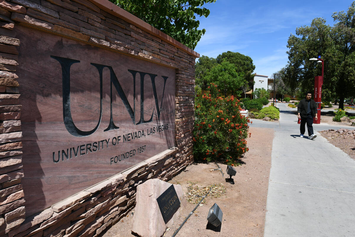 A student walks by a sign on the UNLV campus in Las Vegas. (Sam Morris/Las Vegas Review-Journal)