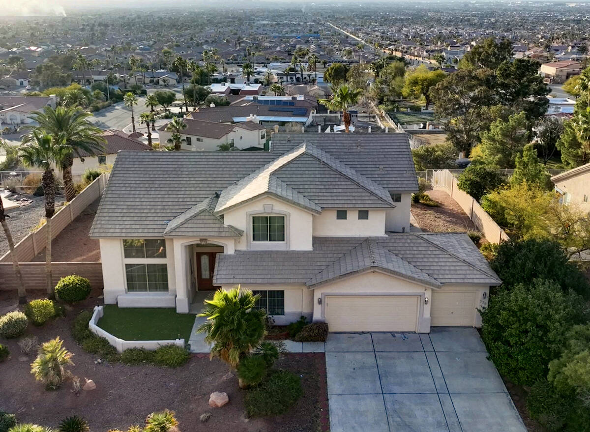 An aerial view of a home at 979 Sugar Springs Drive, near North Hollywood Boulevard and East Wa ...