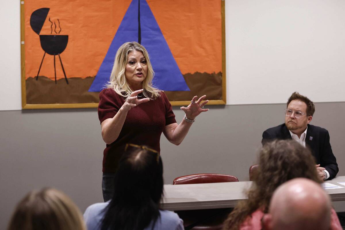 Henderson Mayor Michelle Romero, left, speaks during a forum at Black Mountain Recreation Cente ...