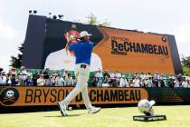 FILE - Captain Bryson DeChambeau of Crushers GC hits his shot from the first tee during the fir ...
