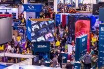 People walk about displays in the Central Hall during the first day of CES 2026 at Las Vegas Co ...
