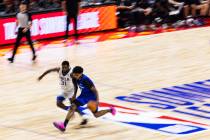 Orlando Magic guard Jase Richardson (11) brings the ball up the court while fighting Philadelph ...