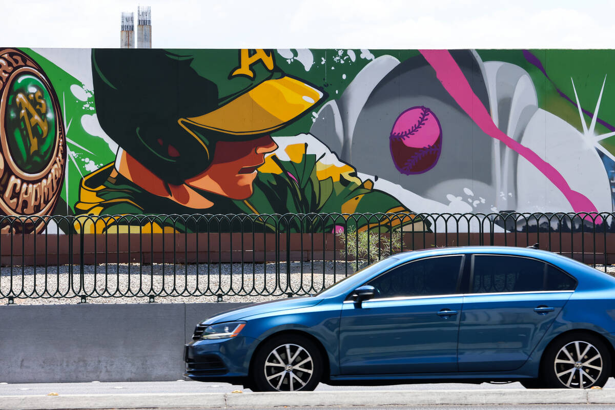 A mural painted by Las Vegas muralist and tattoo artist Brett Rosepiler, is seen along the cons ...