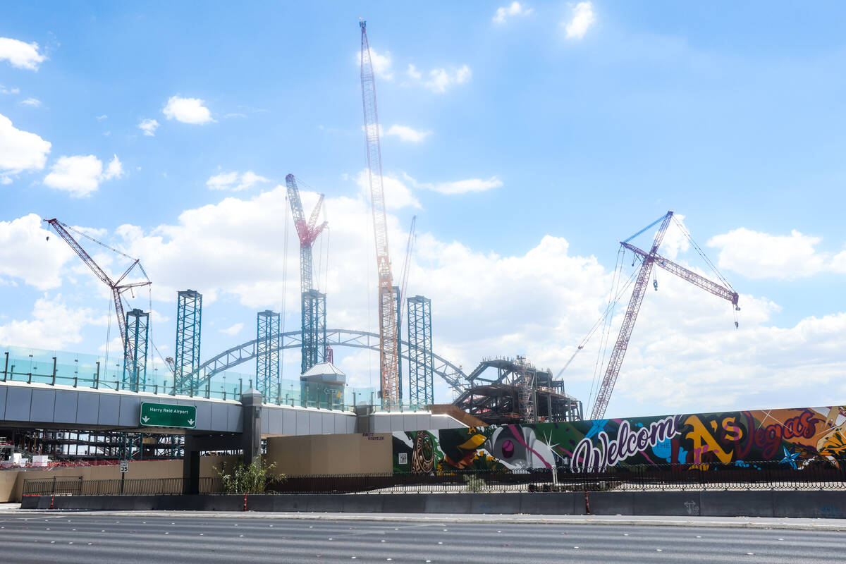 A mural painted by Las Vegas muralist and tattoo artist Brett Rosepiler, is seen along the cons ...