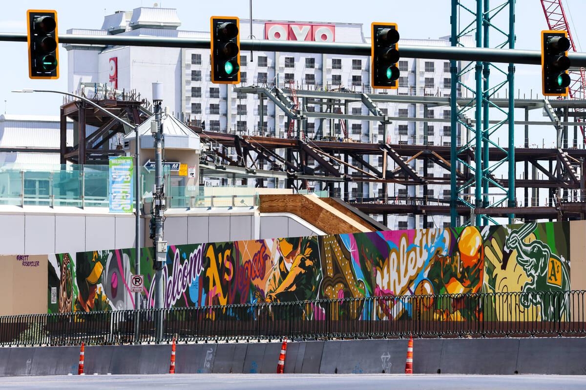 A mural painted by Las Vegas muralist and tattoo artist Brett Rosepiler, is seen along the cons ...