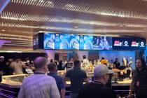 Fans with On Location VIP ticket packages for UFC 329 hang out in the Ghost Lounge inside T-Mob ...