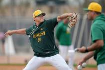 Athletics pitcher Chen Zhong-Ao Zhuang, of Taiwan, works out during spring training baseball Mo ...