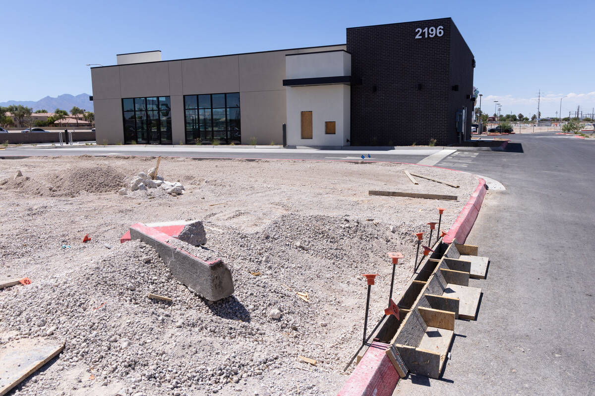 Newly constructed buildings are seen in a plaza at the southeast corner of Rancho Drive and Lak ...