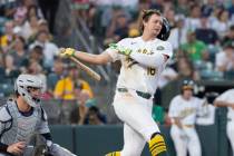 Athletics' Nick Kurtz loses his batting helmet on a swing during the fifth inning of a bas ...