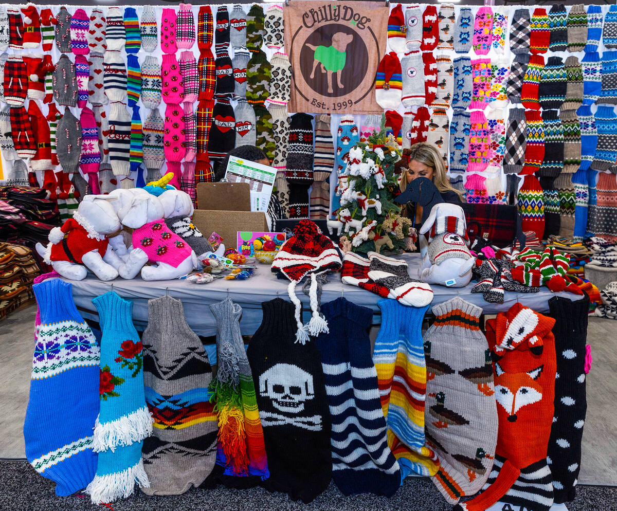 Chilly Dog Sweaters are wool and coming in a variety of sizes and styles on display in their bo ...