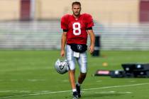 Raiders backmost   Kirk Cousins (8) walks the tract  during an NFL shot   grooming  campy  pract ...