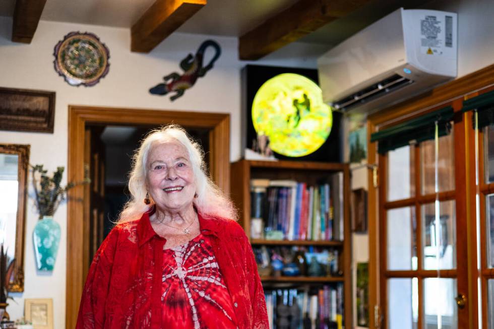 Jean Perry-Jones poses for a portrait with her new air-conditioning unit at her home on Tuesday ...