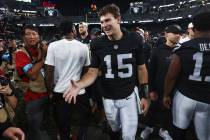 Raiders quarterback Fernando Mendoza (15) greets people following a preseason NFL game against ...