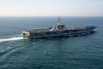 FILE - The USS George Washington aircraft carrier is pictured off the coast of Argentina, May 3 ...