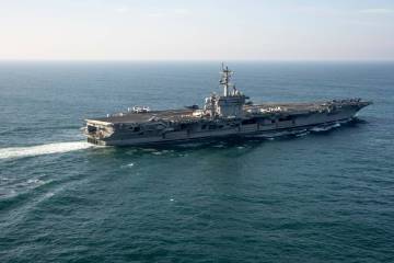 FILE - The USS George Washington aircraft carrier is pictured off the coast of Argentina, May 3 ...