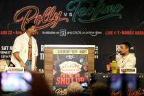 WBA welterweight champion Rolando Romero and challenger Teofimo Lopez, a two-weight world champ ...