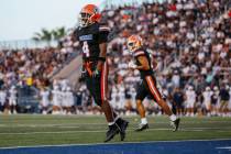 Bishop Gorman running back/wide receiver Noah Cole (4) celebrates a touchdown for the Gaels dur ...