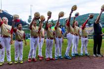 Paseo Verde players and coaches acknowledge the fans before they face Curacao during their Litt ...