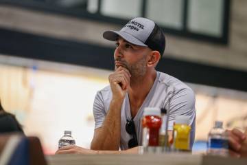 Developer David Raanan listens to a monthly meeting including members of the Naked City communi ...