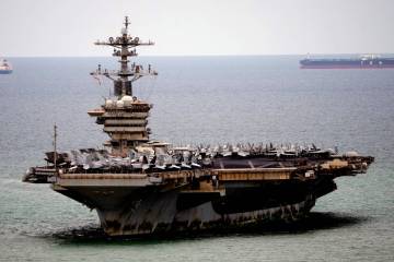 The U.S. Navy aircraft carrier USS Abraham Lincoln arrives at the port in Laem Chabang, Chonbur ...