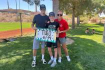 Paseo Verde Little League center fielder Theo Bingham, center, with his mom, UNLV women's socce ...
