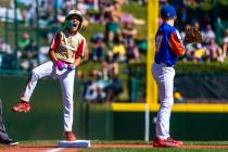 Paseo Verde runner Owen Guzman (3) is pumped up as he safely makes it to third base against Ohi ...